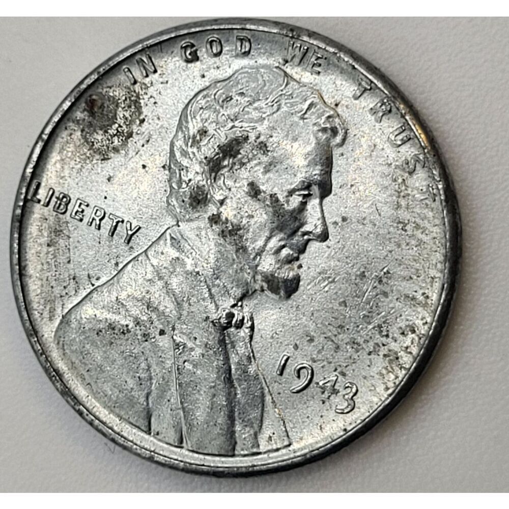 Rare steel 1943 no mint mark wheat penny, Error- L Touches Rim